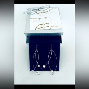 Silver Dangling Earrings with pearls in box.